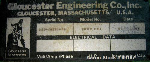 Used Gloucester 3-1/2" Single Screw Extruder, Model 233-001. Approximately 30 to 1 L/D ratio. Electrically heated, water cooled barrel. Driven by a 100 hp DC motor thru a gearbox, ratio 15.398 to 1. ...