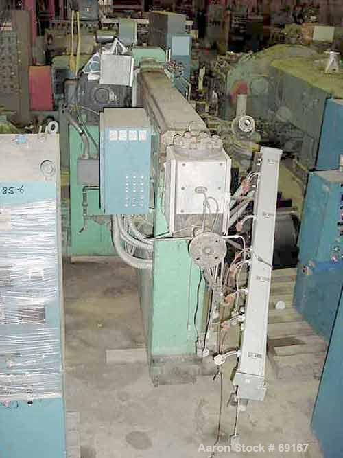 Used Gloucester 3-1/2" Single Screw Extruder, Model 233-001. Approximately 30 to 1 L/D ratio. Electrically heated, water cooled barrel. Driven by a 100 hp DC motor thru a gearbox, ratio 15.398 to 1. ...