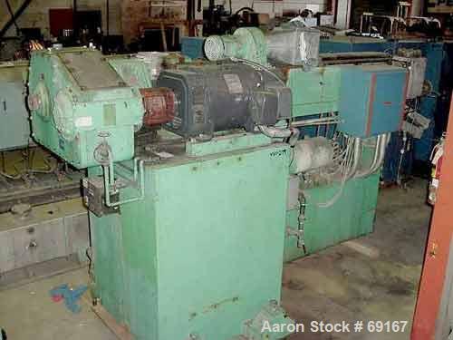 Used Gloucester 3-1/2" Single Screw Extruder, Model 233-001. Approximately 30 to 1 L/D ratio. Electrically heated, water cooled barrel. Driven by a 100 hp DC motor thru a gearbox, ratio 15.398 to 1. ...