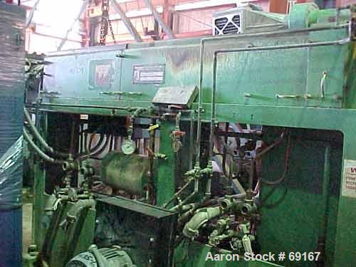 Used Gloucester 3-1/2" Single Screw Extruder, Model 233-001. Approximately 30 to 1 L/D ratio. Electrically heated, water cooled barrel. Driven by a 100 hp DC motor thru a gearbox, ratio 15.398 to 1. ...