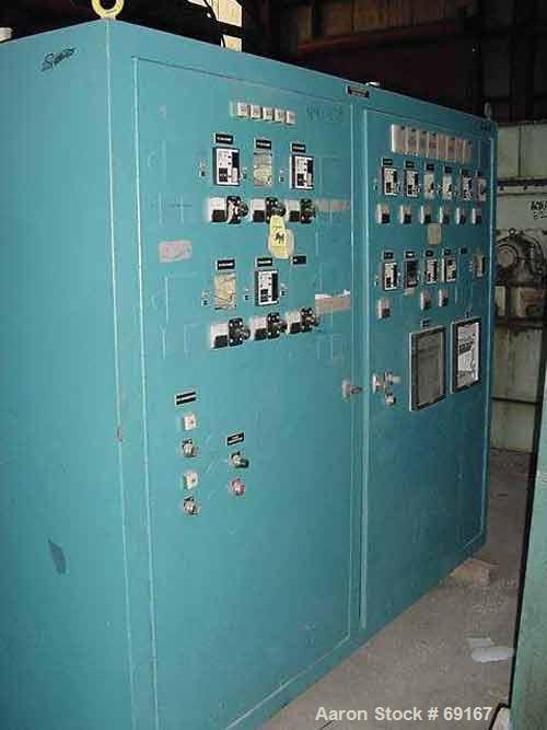 Used Gloucester 3-1/2" Single Screw Extruder, Model 233-001. Approximately 30 to 1 L/D ratio. Electrically heated, water cooled barrel. Driven by a 100 hp DC motor thru a gearbox, ratio 15.398 to 1. ...