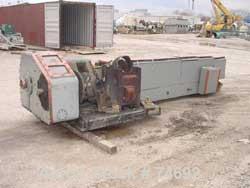 USED:Gloucester 6" air cooled extruder, 24:1 L/D ratio. Hopper with2 additive feeders. No motor.