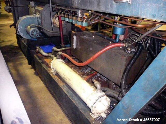 Used Graham 4.5" Single Screw Extruder. 24 to 1 L/D. 6 Zone non-vented. Has electrically heated, water cooled barrel. Extruder equipped with 200 hp DC motor with SCR control and 42" centerline height...