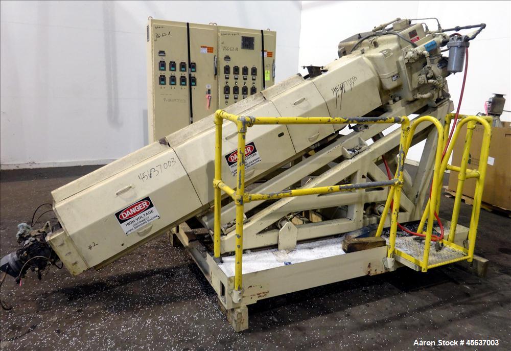 Used Graham Engineering 3-1/2" Single Screw Extruder. 24 to 1 L/D Ratio. Electrically heated, air cooled 5 zone non-vented barrel. Water cooled feed throat with hopper. Driven by a 100hp, 500 volt, 1...