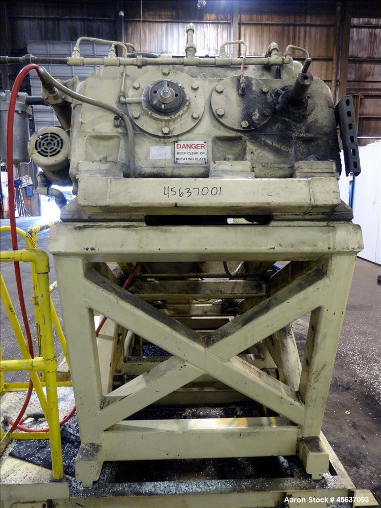 Used Graham Engineering 3-1/2" Single Screw Extruder. 24 to 1 L/D Ratio. Electrically heated, air cooled 5 zone non-vented barrel. Water cooled feed throat with hopper. Driven by a 100hp, 500 volt, 1...