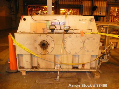 Used Hartig 10" Single Screw Extruder. Approximately 33:1 L/D ratio. Electrically heated, water cooled non-vented barrel. Feed throat, no hopper. Unit includes a Wilson model D4545 gearbox, rated at ...