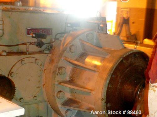 Used Hartig 10" Single Screw Extruder. Approximately 33:1 L/D ratio. Electrically heated, water cooled non-vented barrel. Feed throat, no hopper. Unit includes a Wilson model D4545 gearbox, rated at ...