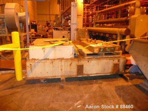 Used Hartig 10" Single Screw Extruder. Approximately 33:1 L/D ratio. Electrically heated, water cooled non-vented barrel. Feed throat, no hopper. Unit includes a Wilson model D4545 gearbox, rated at ...