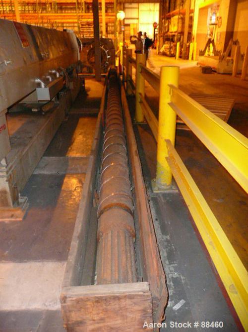 Used Hartig 10" Single Screw Extruder. Approximately 33:1 L/D ratio. Electrically heated, water cooled non-vented barrel. Feed throat, no hopper. Unit includes a Wilson model D4545 gearbox, rated at ...