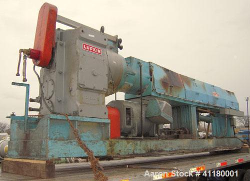 Used Hartig 6" Single Screw Extruder. Model 60/100M24, 24:1 L/D Ratio.  7 zone barrel, electrically heated, water cooled with a 1 1/2 hp pump and heat exchanger, no tank. Water cooled feed with hoppe...