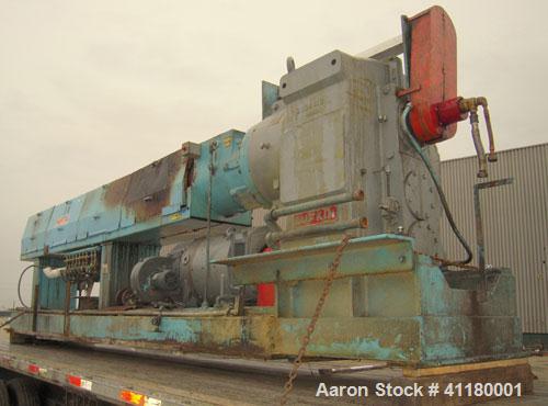 Used Hartig 6" Single Screw Extruder. Model 60/100M24, 24:1 L/D Ratio.  7 zone barrel, electrically heated, water cooled with a 1 1/2 hp pump and heat exchanger, no tank. Water cooled feed with hoppe...