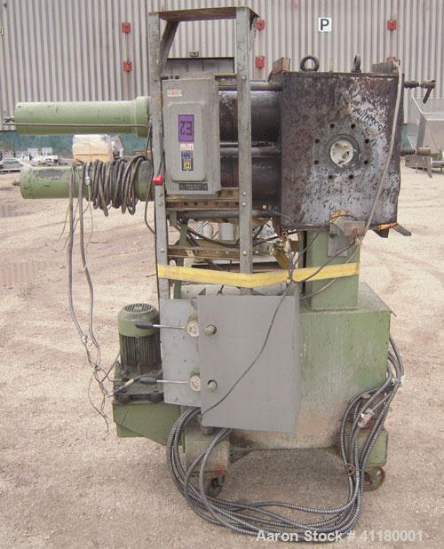 Used Hartig 6" Single Screw Extruder. Model 60/100M24, 24:1 L/D Ratio.  7 zone barrel, electrically heated, water cooled with a 1 1/2 hp pump and heat exchanger, no tank. Water cooled feed with hoppe...