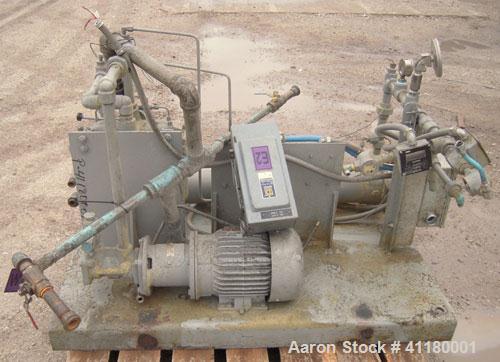 Used Hartig 6" Single Screw Extruder. Model 60/100M24, 24:1 L/D Ratio.  7 zone barrel, electrically heated, water cooled with a 1 1/2 hp pump and heat exchanger, no tank. Water cooled feed with hoppe...