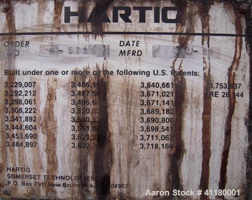 Used Hartig 6" Single Screw Extruder. Model 60/100M24, 24:1 L/D Ratio.  7 zone barrel, electrically heated, water cooled with a 1 1/2 hp pump and heat exchanger, no tank. Water cooled feed with hoppe...