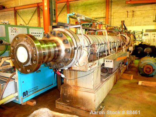 USED: Hartig 8" single screw extruder. Approximately 32:1 L/D ratio. Electrically heated, water cooled, non-vented barrel. Feed throat with hopper/crammer feeder with motor. Driven by a 700 hp DC mot...