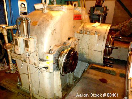 USED: Hartig 8" single screw extruder. Approximately 32:1 L/D ratio. Electrically heated, water cooled, non-vented barrel. Feed throat with hopper/crammer feeder with motor. Driven by a 700 hp DC mot...