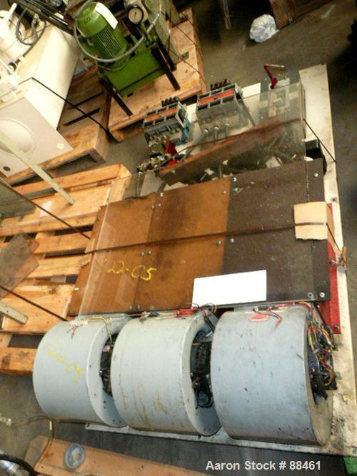 USED: Hartig 8" single screw extruder. Approximately 32:1 L/D ratio. Electrically heated, water cooled, non-vented barrel. Feed throat with hopper/crammer feeder with motor. Driven by a 700 hp DC mot...
