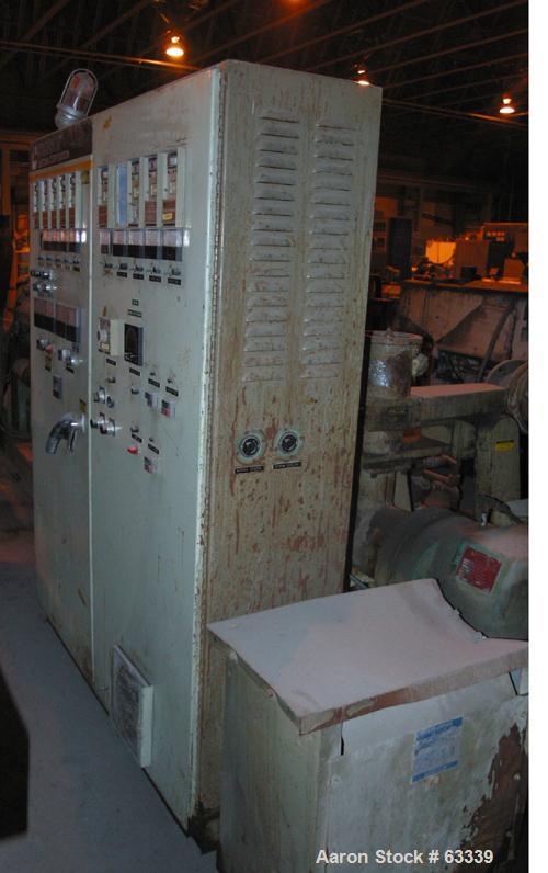 USED: Johnson 2-1/2" Lowboy single screw extruder. 24:1 L/D ratio, electrically heated, water cooled with pump, heat exchanger and holding tank, 4 zone side vented barrel. Water cooled feed with a 1 ...