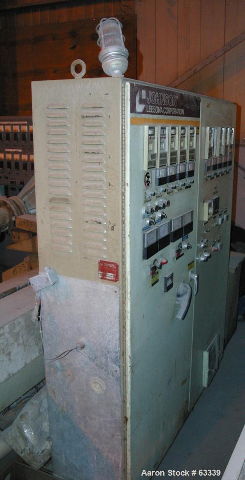 USED: Johnson 2-1/2" Lowboy single screw extruder. 24:1 L/D ratio, electrically heated, water cooled with pump, heat exchanger and holding tank, 4 zone side vented barrel. Water cooled feed with a 1 ...