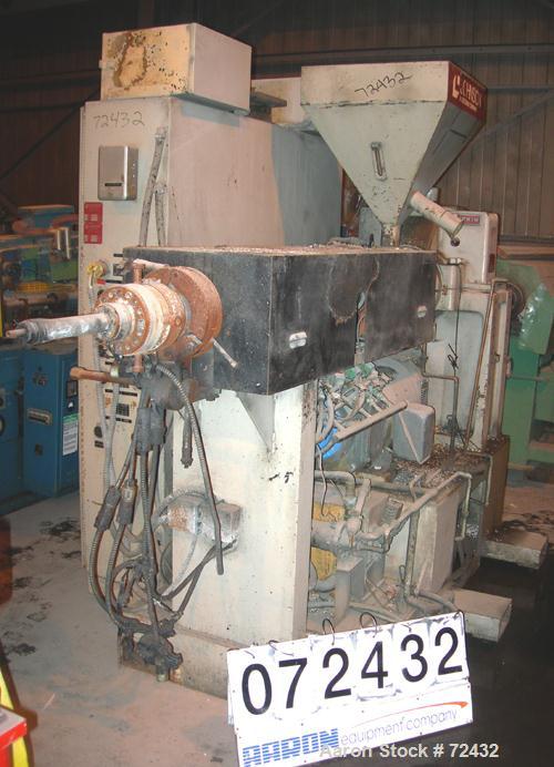 Used Johnson 2.5" Single Screw Extruder, approximately 24:1 L/D ratio. Electrically heated, water cooled, with a closed loop system with tank, heat exchanger and pump. 4 zone side vented (plugged) ba...