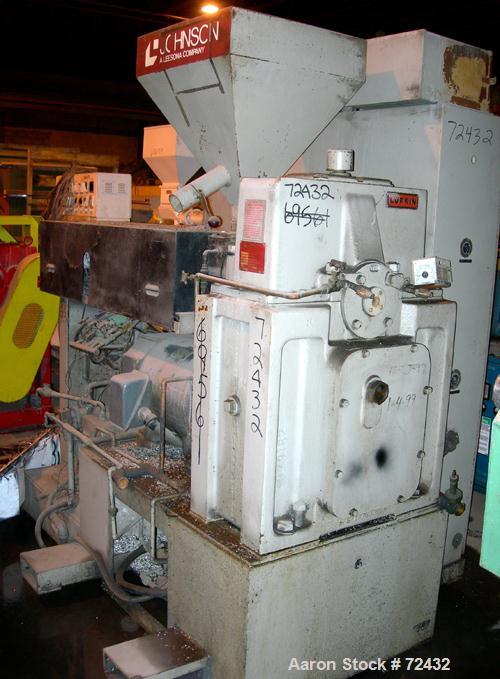 Used Johnson 2.5" Single Screw Extruder, approximately 24:1 L/D ratio. Electrically heated, water cooled, with a closed loop system with tank, heat exchanger and pump. 4 zone side vented (plugged) ba...