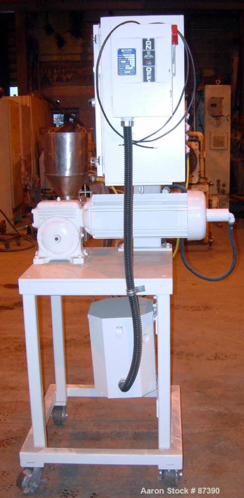 USED: Killion 1" screw diameter single screw extruder, model KLB-100. 24:1 L/D ratio. Electrically heated, air cooled, 3 zone vented barrel. Water cooled feed throat. Driven by a 3 hp, 180 volt, DC g...