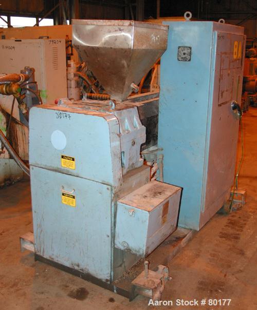 USED: Killian 2.5" extruder, model KN-250. 24:1 L/D ratio, 4 zone, electrically heated, air cooled barrel, 4" x 3" feed throat with hopper, 43" center line, approximate 40 hp drive, Koellmann gear 13...