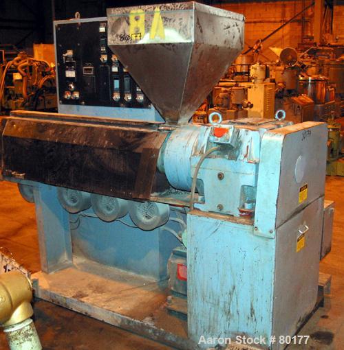 USED: Killian 2.5" extruder, model KN-250. 24:1 L/D ratio, 4 zone, electrically heated, air cooled barrel, 4" x 3" feed throat with hopper, 43" center line, approximate 40 hp drive, Koellmann gear 13...