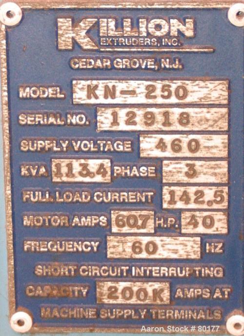 USED: Killian 2.5" extruder, model KN-250. 24:1 L/D ratio, 4 zone, electrically heated, air cooled barrel, 4" x 3" feed throat with hopper, 43" center line, approximate 40 hp drive, Koellmann gear 13...