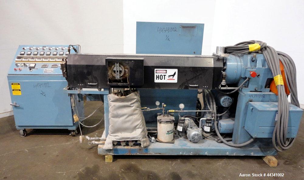 Used Killion 2.5" Single Screw Extruder, Model KN250. Approximately 30 to 1 L/D ratio, electrically heated, water cooled 4 zone side vented barrel with vacuum pump and tank. No water system for cooli...