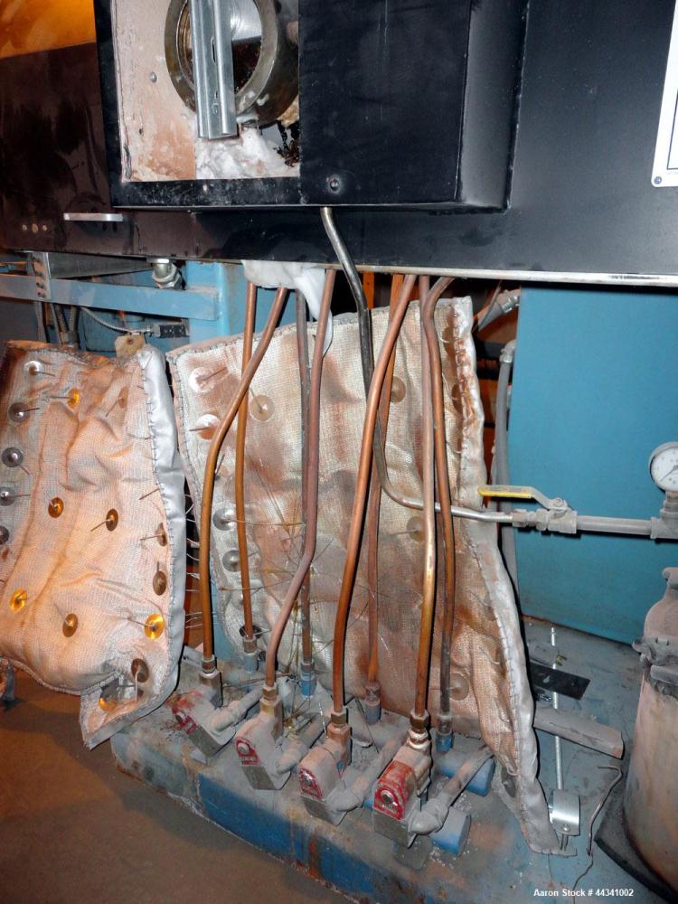 Used Killion 2.5" Single Screw Extruder, Model KN250. Approximately 30 to 1 L/D ratio, electrically heated, water cooled 4 zone side vented barrel with vacuum pump and tank. No water system for cooli...