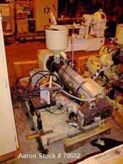 USED: Kuhne type K45-24D 48mm (1.88") single screw extruder, approx 24:1 L/D ratio. Electrically heated, air cooled. Water cooled feedthroat with hopper. Requires an approx 34 kw (45 hp) DC motor.Inc...