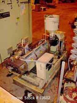 USED: Kuhne type K45-24D 48mm (1.88") single screw extruder, approx 24:1 L/D ratio. Electrically heated, air cooled. Water cooled feedthroat with hopper. Requires an approx 34 kw (45 hp) DC motor.Inc...