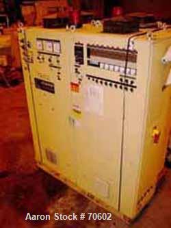USED: Kuhne type K45-24D 48mm (1.88") single screw extruder, approx 24:1 L/D ratio. Electrically heated, air cooled. Water cooled feedthroat with hopper. Requires an approx 34 kw (45 hp) DC motor.Inc...