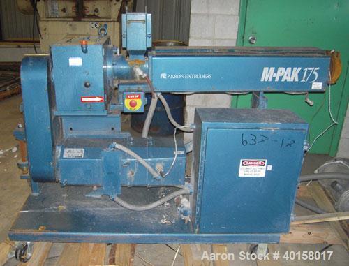 Used Akron 1 3/4" Single Screw Extruder, Model M-PAK175, approximate 24 to 1 L/D ratio. Electrically heated, air cooled 3 zone non-vented barrel. Water cooled feed throat with a lump breaker, no hopp...