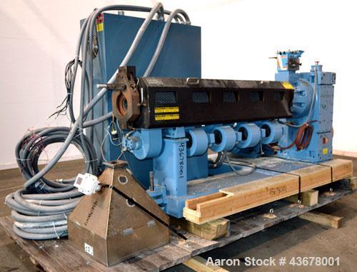 Used Merritt Davis 3-1/2” Single Screw, Model A/C MX R.H. Approximate 24 to 1 L/D ratio. Electrically heated, air cooled 5 zone non-vented barrel, approximate 42" centerline height. Water cooled feed...