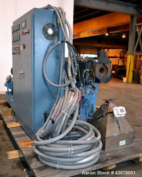 Used Merritt Davis 3-1/2” Single Screw, Model A/C MX R.H. Approximate 24 to 1 L/D ratio. Electrically heated, air cooled 5 zone non-vented barrel, approximate 42" centerline height. Water cooled feed...