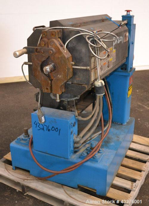 Used Merritt Davis 1-1/2” Single Screw, Model A/C MX. Approximate 24 to 1 L/D ratio. Electrically heated, air cooled 4 zone non-vented barrel, approximate 42" centerline height. Water cooled feed thr...