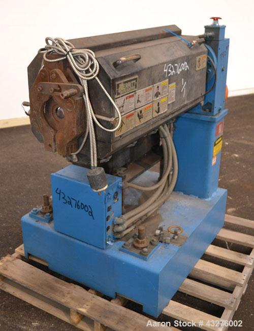 Used Merritt Davis 1-1/2” Single Screw, Model A/C MX. Approximate 24 to 1 L/D ratio. Electrically heated, air cooled 4 zone non-vented barrel, approximate 42" centerline height. Water cooled feed thr...