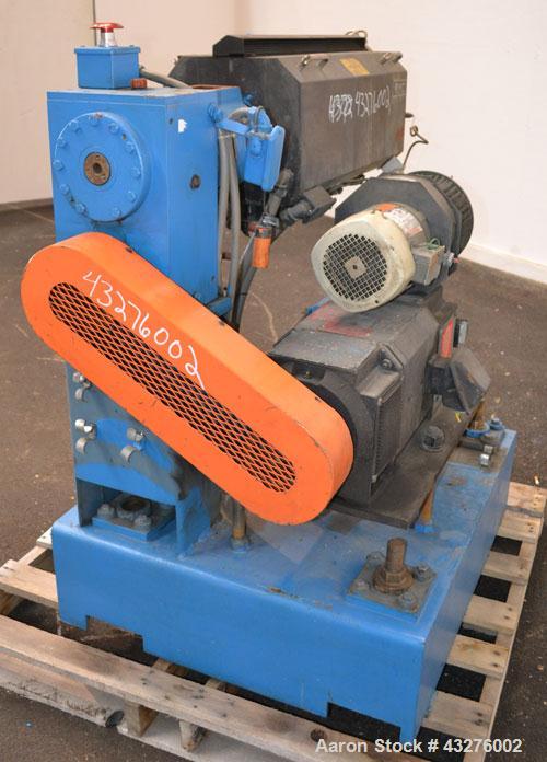 Used Merritt Davis 1-1/2” Single Screw, Model A/C MX. Approximate 24 to 1 L/D ratio. Electrically heated, air cooled 4 zone non-vented barrel, approximate 42" centerline height. Water cooled feed thr...