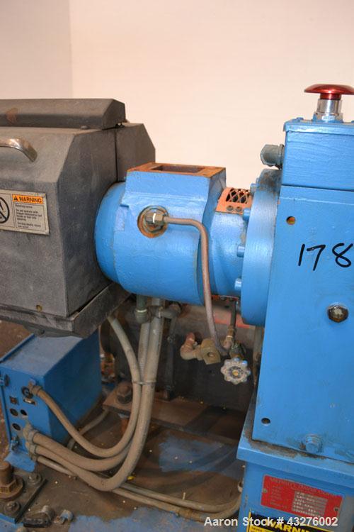 Used Merritt Davis 1-1/2” Single Screw, Model A/C MX. Approximate 24 to 1 L/D ratio. Electrically heated, air cooled 4 zone non-vented barrel, approximate 42" centerline height. Water cooled feed thr...