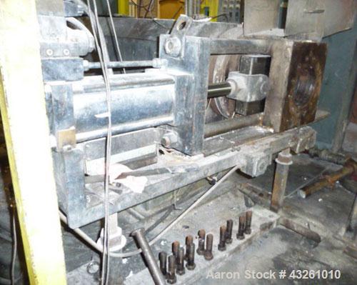 Used Merritt Davis 8" Hot Feed Extruder, approximate 12 to 1 L/D ratio. Electrically heated, water cooled. Vented/plugged barrel, 103’’ long. Oversize feed throat, 34’’ x 29’’ with a ram assist. Extr...