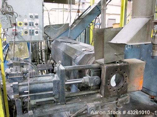 Used Merritt Davis 8" Hot Feed Extruder, approximate 12 to 1 L/D ratio. Electrically heated, water cooled. Vented/plugged barrel, 103’’ long. Oversize feed throat, 34’’ x 29’’ with a ram assist. Extr...