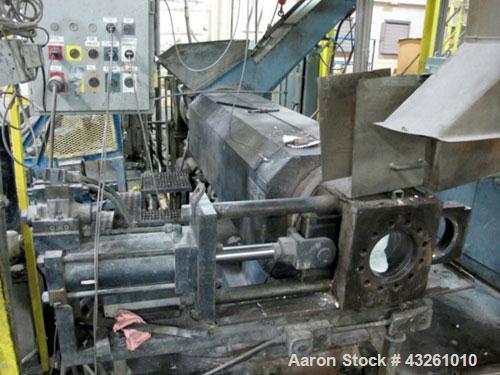 Used Merritt Davis 8" Hot Feed Extruder, approximate 12 to 1 L/D ratio. Electrically heated, water cooled. Vented/plugged barrel, 103’’ long. Oversize feed throat, 34’’ x 29’’ with a ram assist. Extr...
