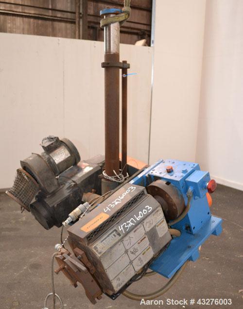 Used Merritt Davis ¾” Pedestal Mounted Single Screw Co-Extruder. Approximate 24 to 1 L/D ratio. Electrically heated, air cooled 3 zone non-vented barrel. Feed throat, no hopper. Driven by a 3 hp, 500...