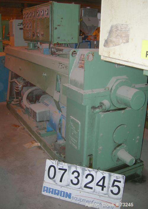 USED: NRM 4-1/2" single screw extruder, model PM70. 24:1 L/D ratio. Approx 6 zone top vented barrel, electrically heated, water cooled, with pump and tank. Water cooled feed throat. Approximate 42" c...