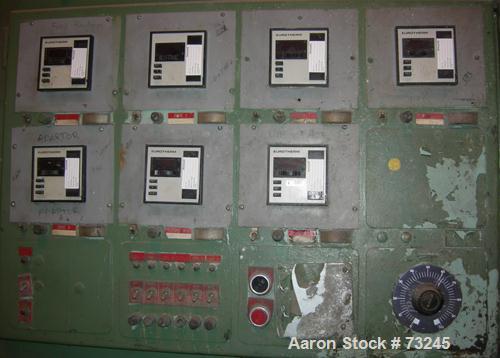 USED: NRM 4-1/2" single screw extruder, model PM70. 24:1 L/D ratio. Approx 6 zone top vented barrel, electrically heated, water cooled, with pump and tank. Water cooled feed throat. Approximate 42" c...