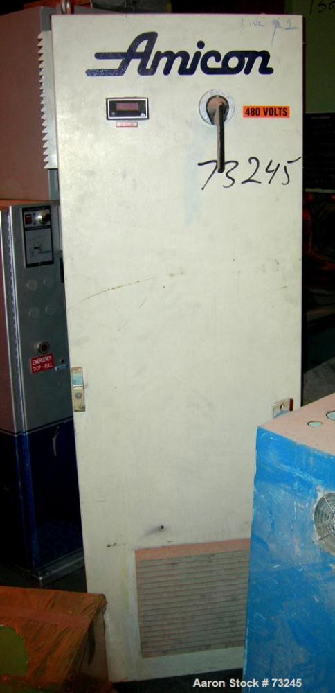 USED: NRM 4-1/2" single screw extruder, model PM70. 24:1 L/D ratio. Approx 6 zone top vented barrel, electrically heated, water cooled, with pump and tank. Water cooled feed throat. Approximate 42" c...