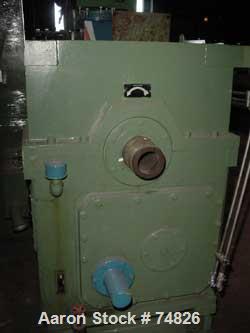 USED: NRM extruder, model PM70. 6" screw diameter, 24:1 L/D ratio. Electrically heated, water cooled, non-vented. Reconditioned in 1986. 6 barrel zones. 200 hp DC motor drive thru 25.06:1 gearbox rat...