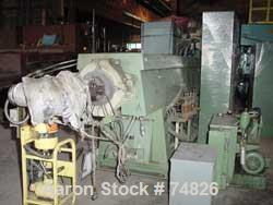 USED: NRM extruder, model PM70. 6" screw diameter, 24:1 L/D ratio. Electrically heated, water cooled, non-vented. Reconditioned in 1986. 6 barrel zones. 200 hp DC motor drive thru 25.06:1 gearbox rat...